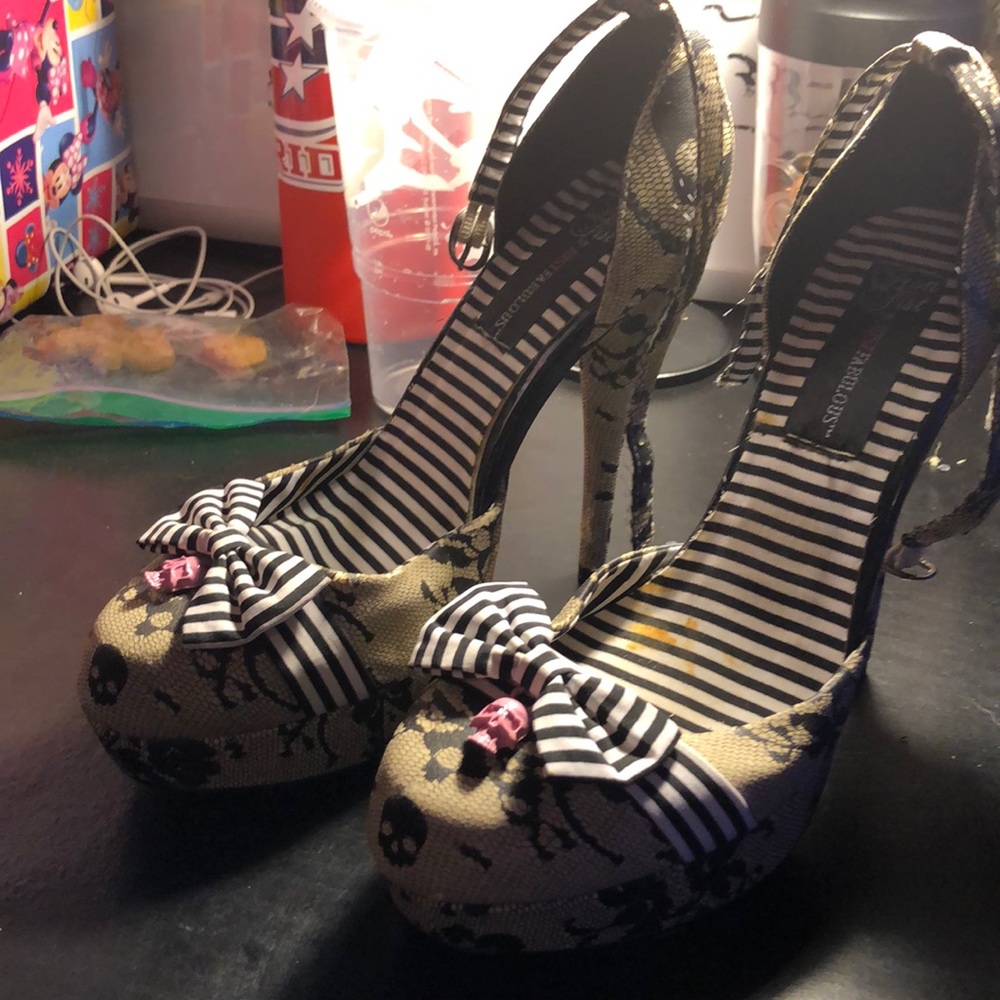 Black and white iron fist high heels